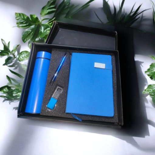 Picture of NEW YEAR DIARY 2026 WITH A PEN,A BOTTLE AND A KEY RING.