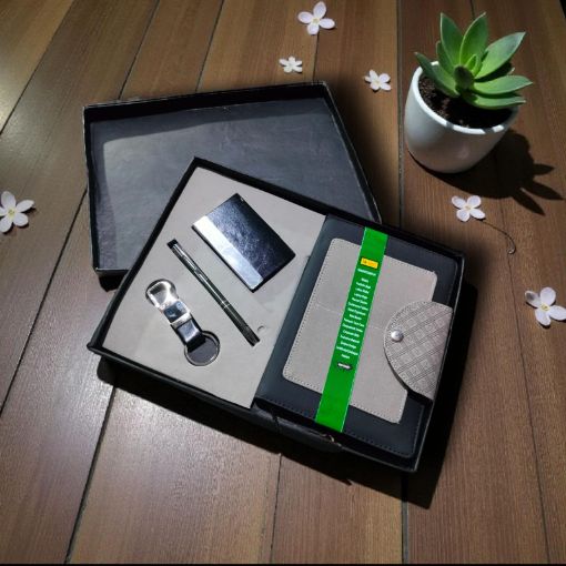 Picture of NEW YEAR DIARY 2026 WITH A PEN, A KEY RING AND A MAGNETIC CARD HOLDER.