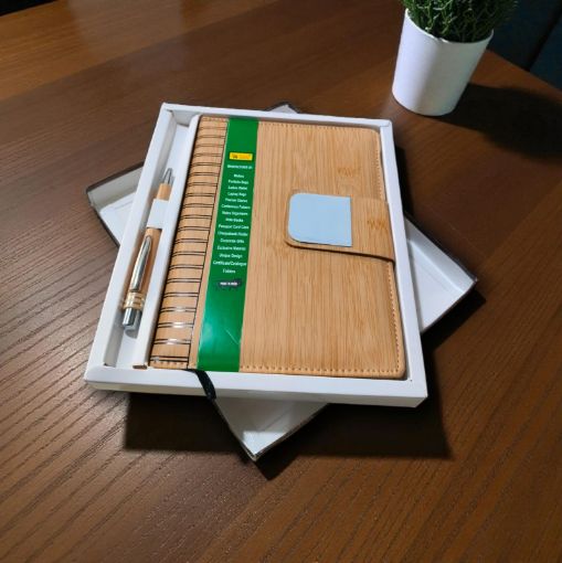 Picture of NEW YEAR DIARY 2026 WOODEN AND WITH A PEN.